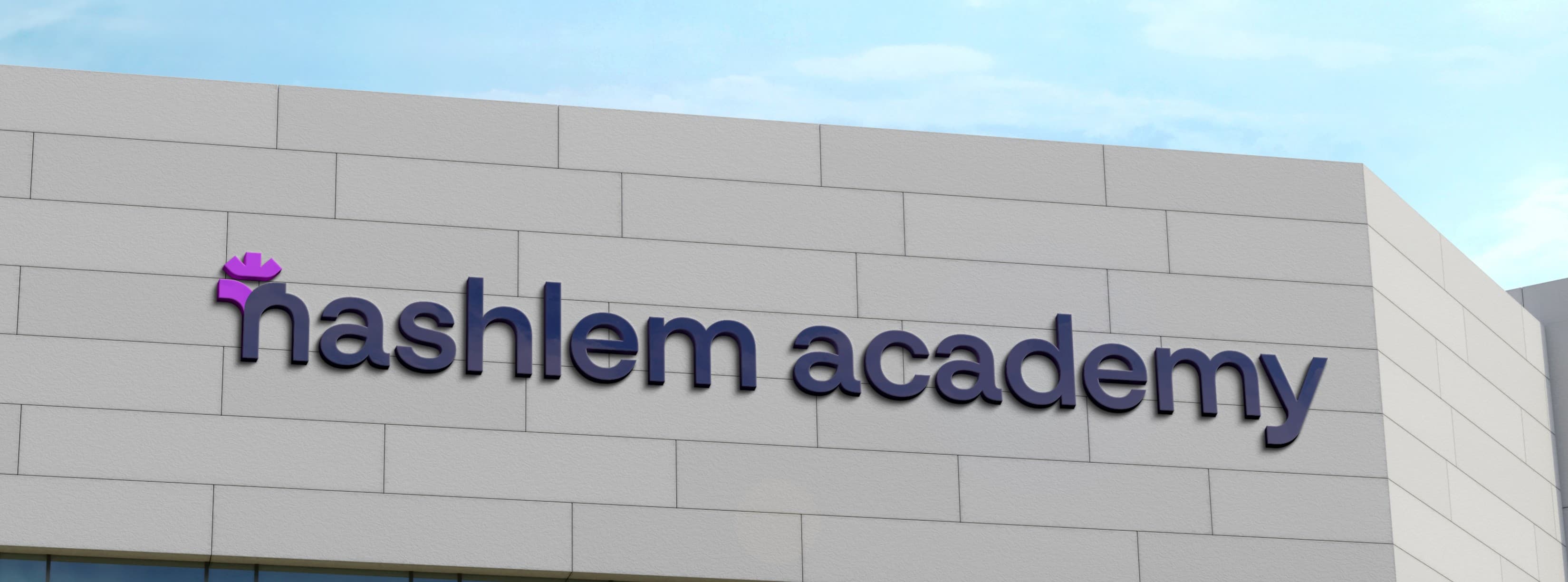 Nashlem Academy logo on building facade